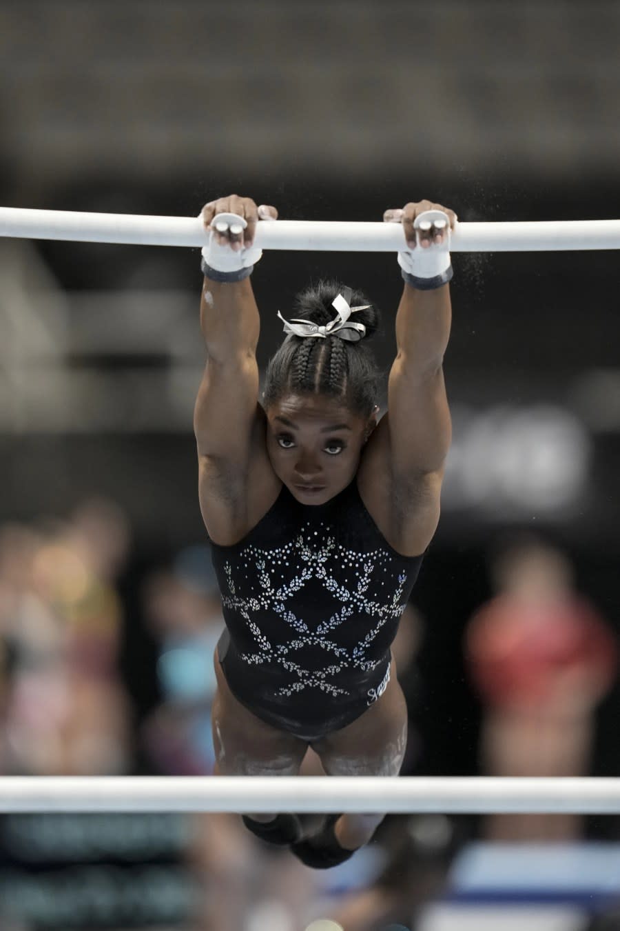 Simone Biles warms up before the U.S. Gymnastics Championships Sunday, Aug. 27, 2023, in San Jose, Calif. (AP Photo/Godofredo A. Vasquez)