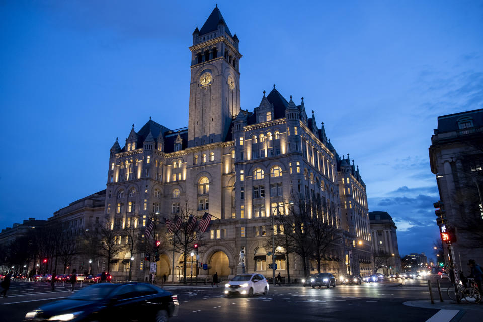 The Trump International Hotel near sunset Wednesday, Jan. 23, 2019, in Washington. (AP Photo/Alex Brandon)