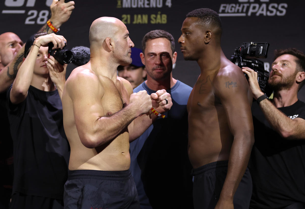 RIO DE JANEIRO, BRAZIL - JANUARY 20: (L-R) Opponents Glover Teixeira of Brazil and Jamahal Hill face off during the UFC 283 weigh-in at Jeunesse Arena on January 20, 2023 in Rio de Janeiro, Brazil. (Photo by Buda Mendes/Zuffa LLC via Getty Images)