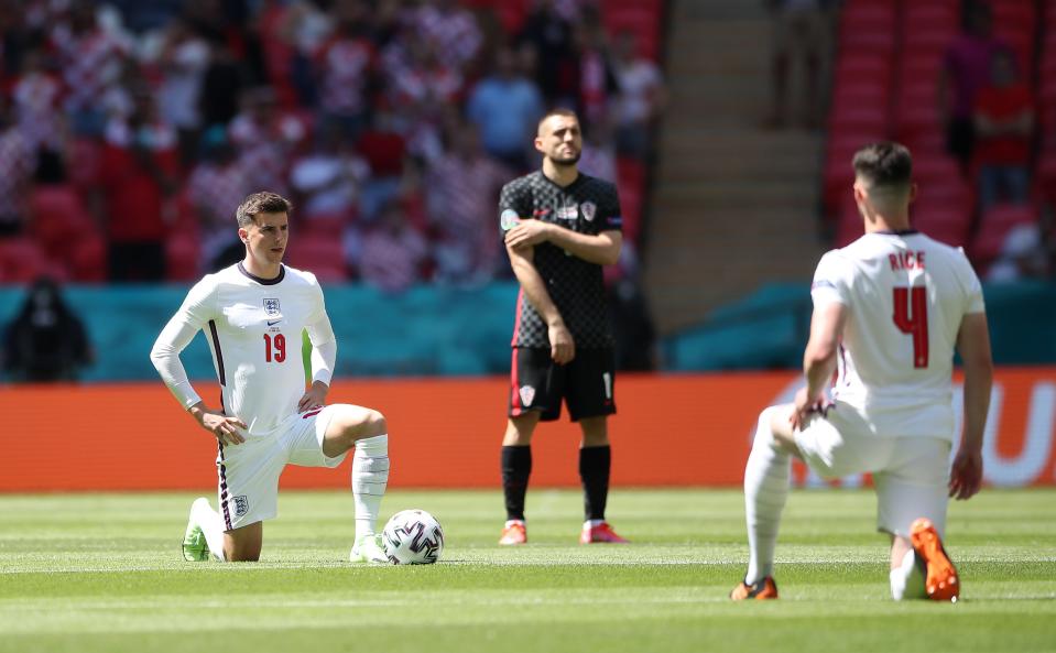 England players were booed for taking the knee by some fans at Wembley ahead of their game with Croatia (PA)