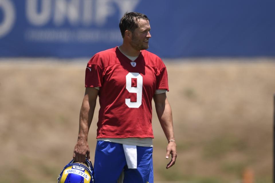 Rams quarterback Matthew Stafford walks on the field after a May practice in Thousand Oaks.