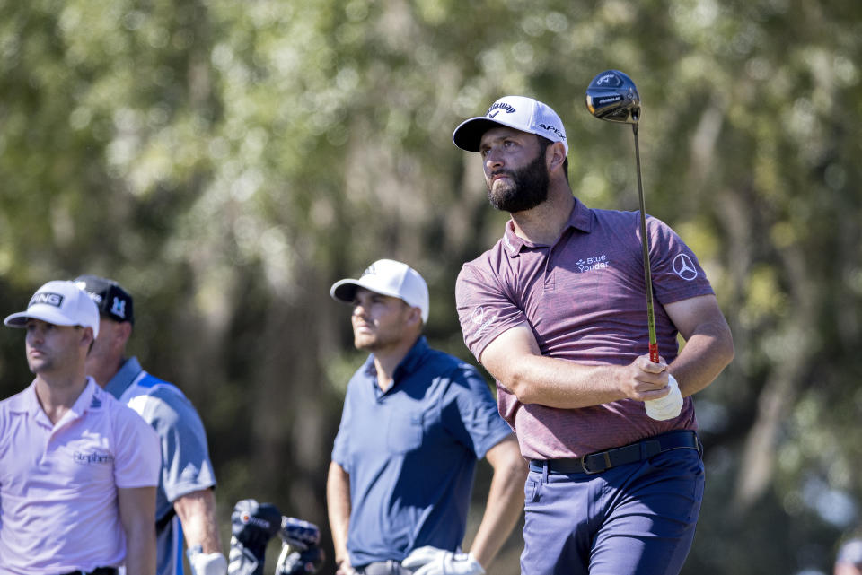 Jon Rahm, of Spain, watches his drive off the second tee during the final round of the CJ Cup golf tournament Sunday, Oct. 23, 2022, in Ridgeland, S.C. (AP Photo/Stephen B. Morton)