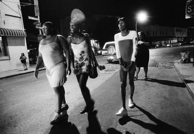 A group of sex workers, including Sugarbear and Charisse, both on the left, walk through the meatpacking district in New York City in September 1999.