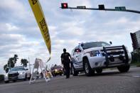 <p>Emergency vehicles wait at a roadblock after a chemical plant operated by the Arkema Group had an explosion during the aftermath of Hurricane Harvey on August 31, 2017 in Crosby, Texas. (Photo: Brendan Smialowski/AFP/Getty Images) </p>