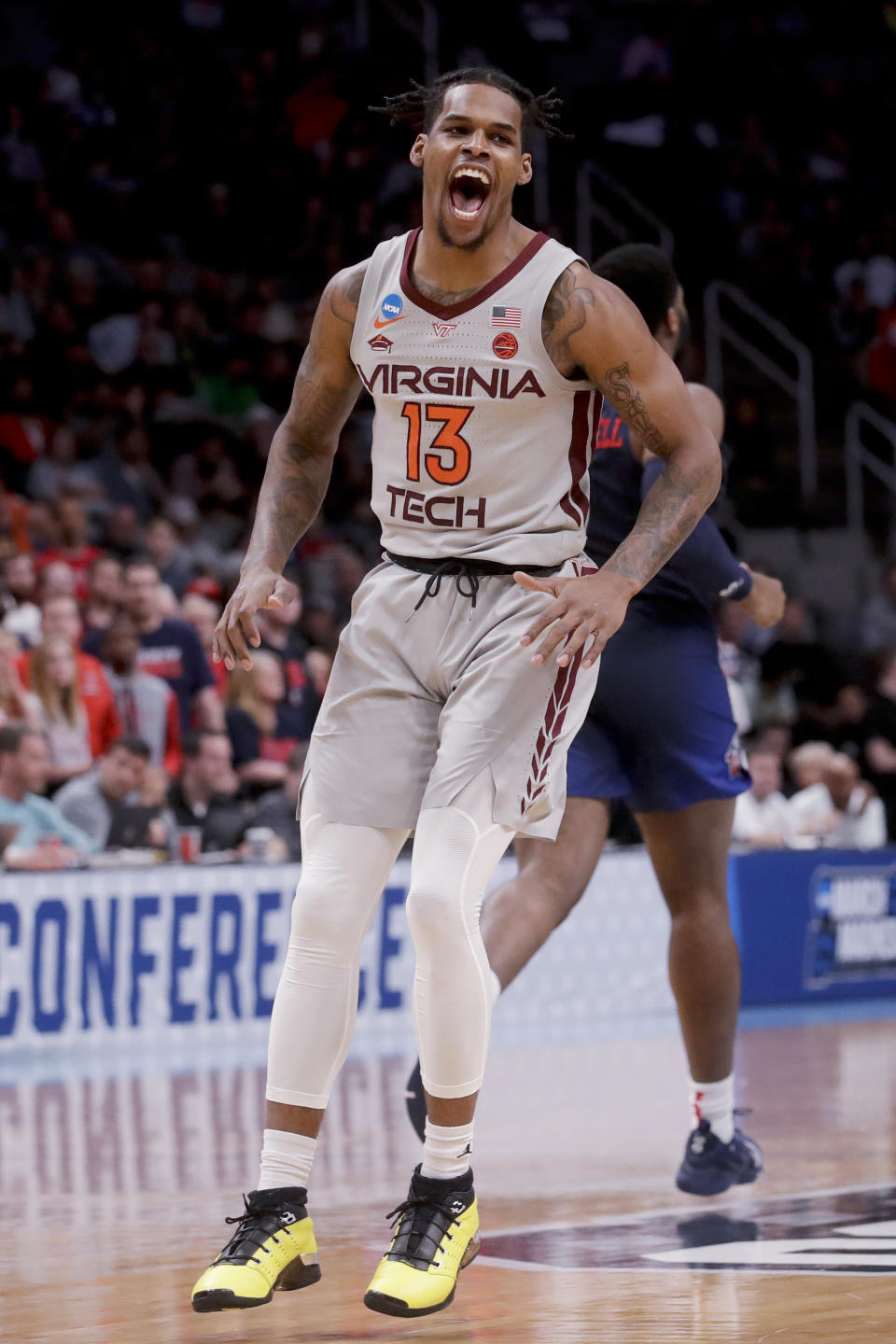 Virginia Tech guard Ahmed Hill celebrates after scoring against Liberty during the second half of a second-round game in the NCAA men's college basketball tournament Sunday, March 24, 2019, in San Jose, Calif. (AP Photo/Jeff Chiu)