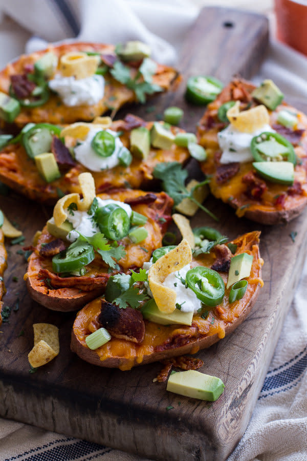 <strong>Get the <a href="http://www.halfbakedharvest.com/chicken-chili-con-carne-stuffed-sweet-potato-skins-links-inspire/">Chicken Chili Con Carne Stuffed Sweet Potato Skins recipe</a>&nbsp;from Half Baked Harvest</strong>