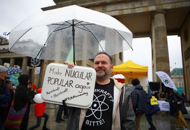 People protest as Germany shuts down its last three nuclear power plants in Berlin