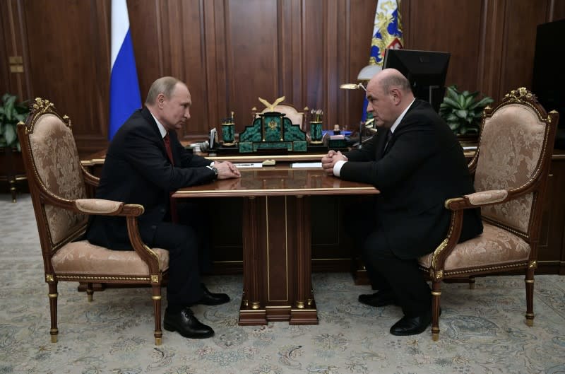 Russian President Putin attends a meeting with head of the Federal Taxation Service Mishustin in Moscow