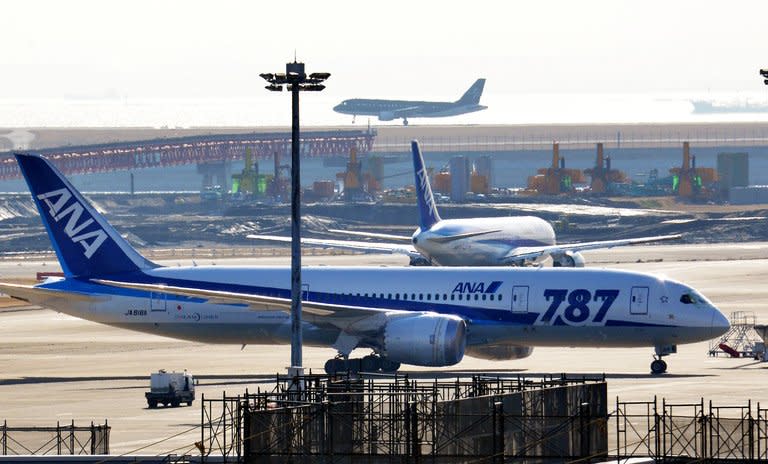 An All Nippon Airways Boeing 787 Dreamliner sits parked at Tokyo's Haneda airport on January 31, 2013. Shares in ANA and battery maker GS Yuasa surged on Thursday after a report that US and Japanese regulators were preparing to give the green light to the resumption of Dreamliner flights