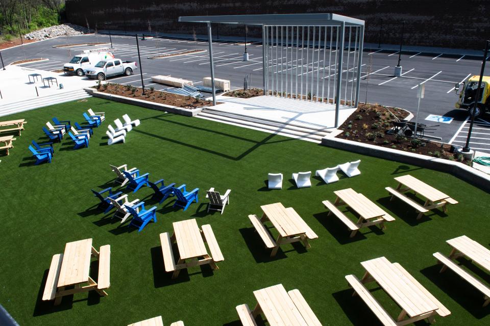 The rooftop bar at Kern's Food Hall includes a view of the event lawn, which will host live entertainment and the biggest televised sports games on a large screen. Seating is available for adults to enjoy alcohol or for kids to enjoy a sweet treat from Irvey's Ice Cream, a vendor whose stall is set up just inside the food hall near the lawn.