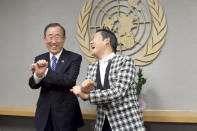 South Korean singer Psy (R), whose real name is Park Jae-sang, visits UN Secretary General Ban Ki-moon at the United Nations on October 23, 2012 in New York City. (Photo by Allison Joyce/Getty Images)