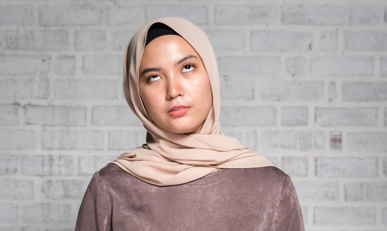 <span class="caption">When overrused phrases reach the point of aggravation, they become cliches.</span> <span class="attribution"><a class="link " href="https://www.gettyimages.com/detail/photo/displeased-malaysian-woman-royalty-free-image/960720308" rel="nofollow noopener" target="_blank" data-ylk="slk:yongyuan/iStock/Getty Images Plus;elm:context_link;itc:0;sec:content-canvas">yongyuan/iStock/Getty Images Plus</a></span>