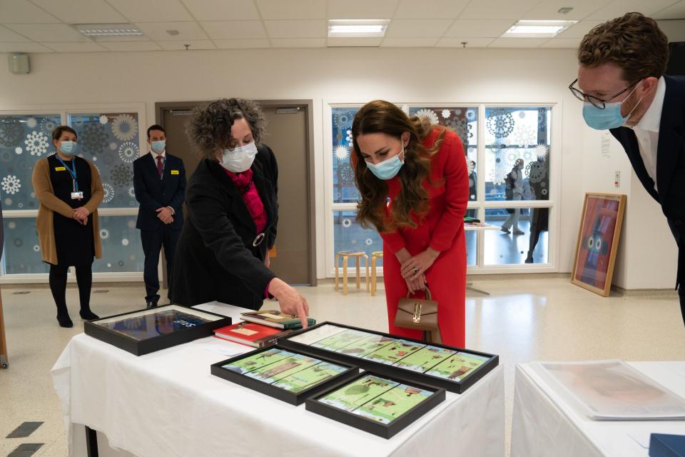 The Duchess of Cambridge with Catsou Roberts, Director of Vital Arts for Barts Health NHS TrustPA
