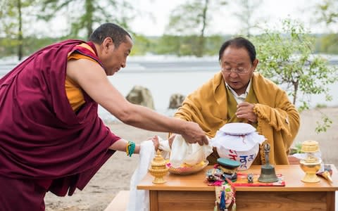 Sogyal Rinpoche and Lama Yonten conduct a ceremony at the opening of the Sukhavati Spiritual Care Center in Bad Saarow, Germany, May 2016  - Credit: Alamy