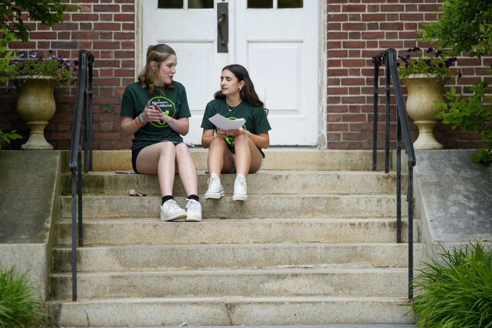 Members of the Junior Newtown Action Alliance prepare to speak at a rally against gun violence on Friday, June 7, 2024 in Newtown, Conn. (AP Photo/Bryan Woolston)