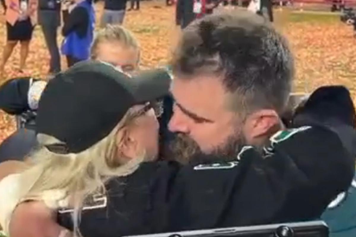 Travis and Jason Kelce Share a Big Brotherly Hug on the Super Bowl Field  Prior to Kick Off