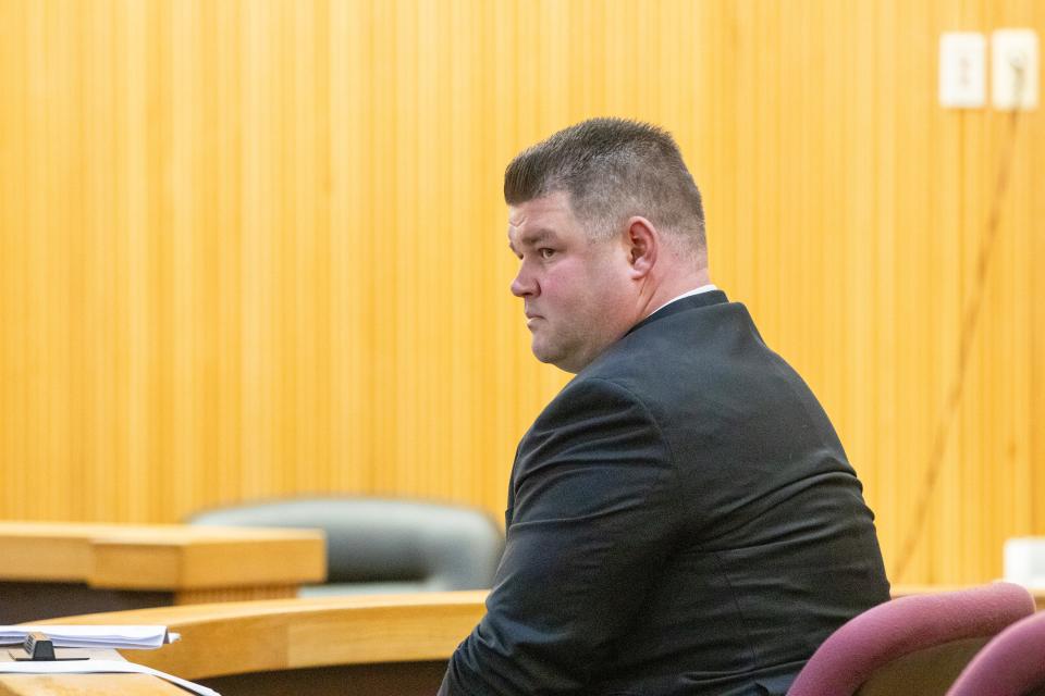 Wall Police Sgt. James Cadigan, who is accused of theft, attends his plea hearing before Superior Court Judge Christie Bevacqua at Monmouth County Courthouse in Freehold, NJ Wednesday, December 20, 2023.