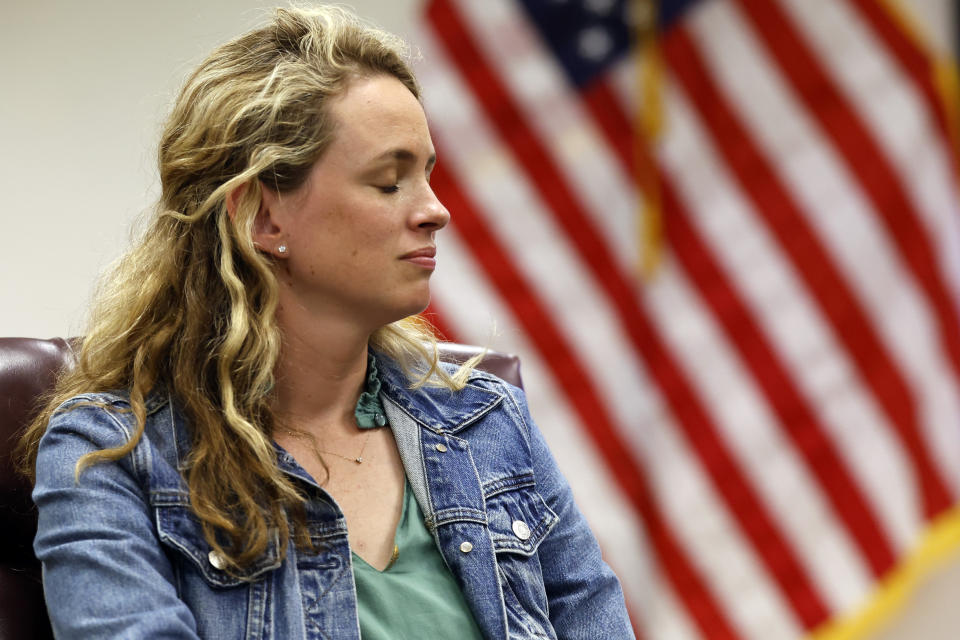 Claire Gray fights back tears as she tells her story about IVF as Secretary of U.S. Health and Human Services, Xavier Becerra hosts a panel discussion with families directly affected by the Alabama Supreme Court Court decision, Tuesday, Feb. 27, 2024, in Birmingham, Ala. (AP Photo/ Butch Dill)