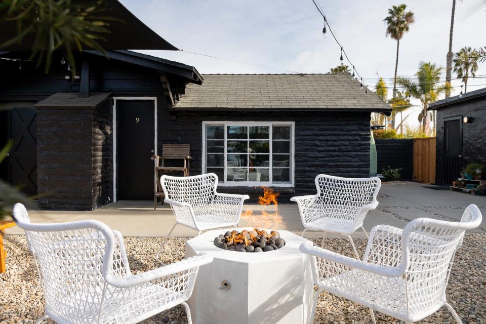 A fire pit outside of The Green Room Hotel