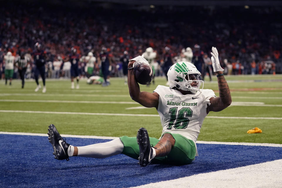 North Texas wide receiver Jyaire Shorter (16) celebrates after making a touchdown catch against UTSA during the second half of an NCAA college football game for the Conference USA championship in San Antonio, Friday, Dec. 2, 2022. (AP Photo/Eric Gay)