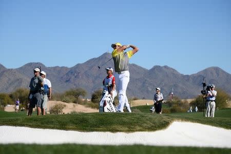 Feb 7, 2016; Scottsdale, AZ, USA; Hideki Matsuyama plays a shot on the 13th hole during the final round of the Waste Management Phoenix Open golf tournament at TPC Scottsdale. Joe Camporeale-USA TODAY Sports