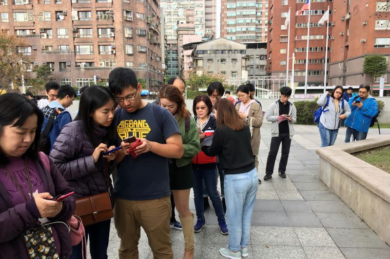 People attend an event organised by Taiwanese NGO Fake News Cleaner on how to spot and report suspected fake news, in New Taipei City