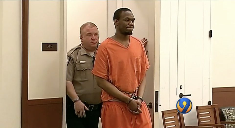 Devalos Perkins is escorted into the court room for a hearing in 2018. His lawyer, Grady Jessup, told the court in his 2018 request to be removed from the case that he was “so concerned for his personal safety that he could not provide effective assistance of counsel if required to sit near (Perkins)“ in court.