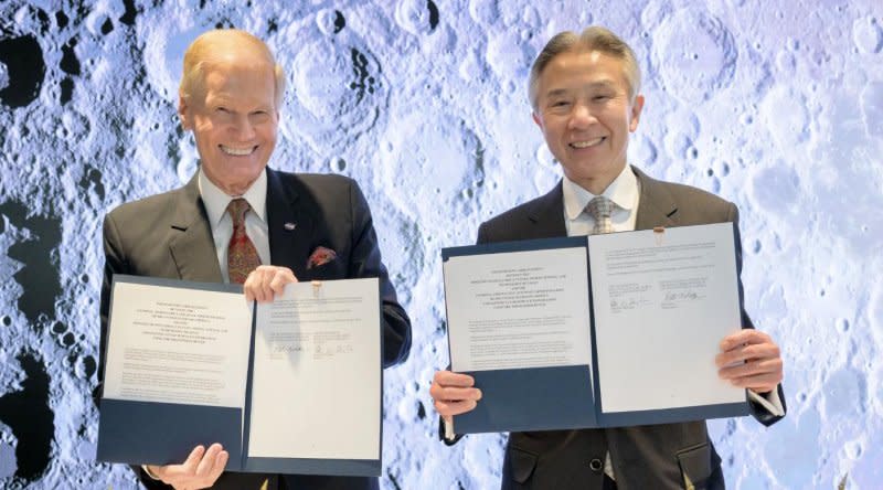 NASA Administrator Bill Nelson, left, and Japan’s Minister of Education, Culture, Sports, Science and Technology Masahito Moriyama, hold signed copies of an historic agreement signed Tuesday between the United States and Japan at NASA Headquarters in Washington, D.C., to advance sustainable human exploration of the moon. Under the agreement, Japan will design, develop, and operate a pressurized rover for crewed and uncrewed moon exploration. Photo courtesy of Bill Ingalls/NASA