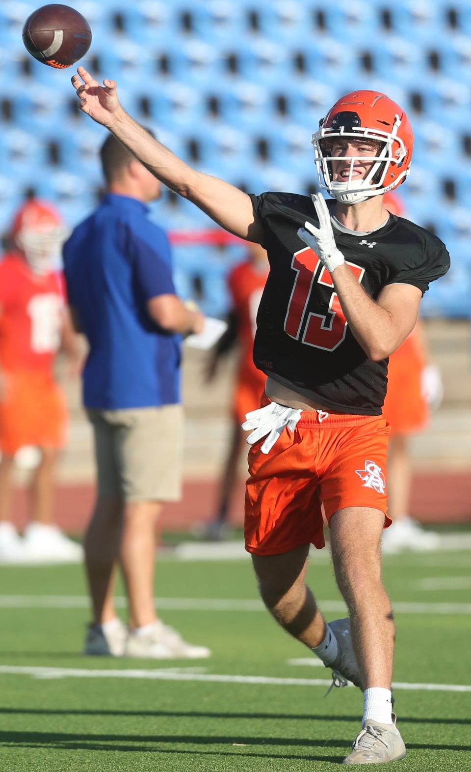 San Angelo Central High School backup quarterback Ben Imler gets a pass off during the first preseason practice at San Angelo Stadium on Monday, Aug. 8, 2022.