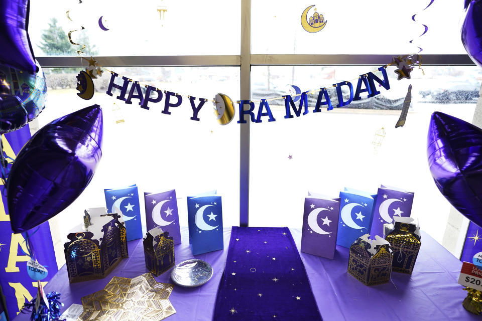 Ramadan decorations are displayed at a Party City store in Dearborn, Mich., on Thursday, March 23, 2023. More businesses are selling Ramadan and Eid items, including DIY kits, lanterns and napkin holders. It's one of the latest signs of big U.S. retailers catering to American Muslim shoppers. Many Muslim Americans enthusiastically welcomed the recognition, applauding those retailers that are making it easier for them to bring their families the cheer that ubiquitously and publicly marks some other faiths' holidays. (AP Photo/Carlos Osorio)