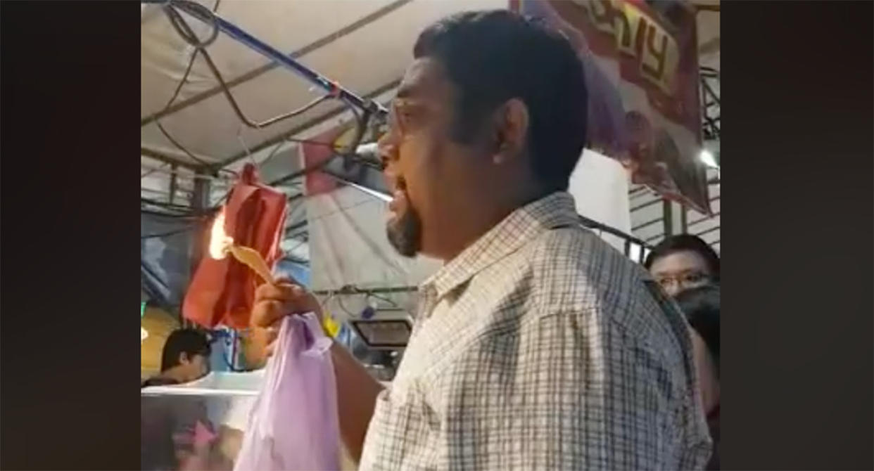 A video circulating online shows a man claiming that some keropok sold at the Hari Raya Bazaar was plastic. (Photo: Facebook)