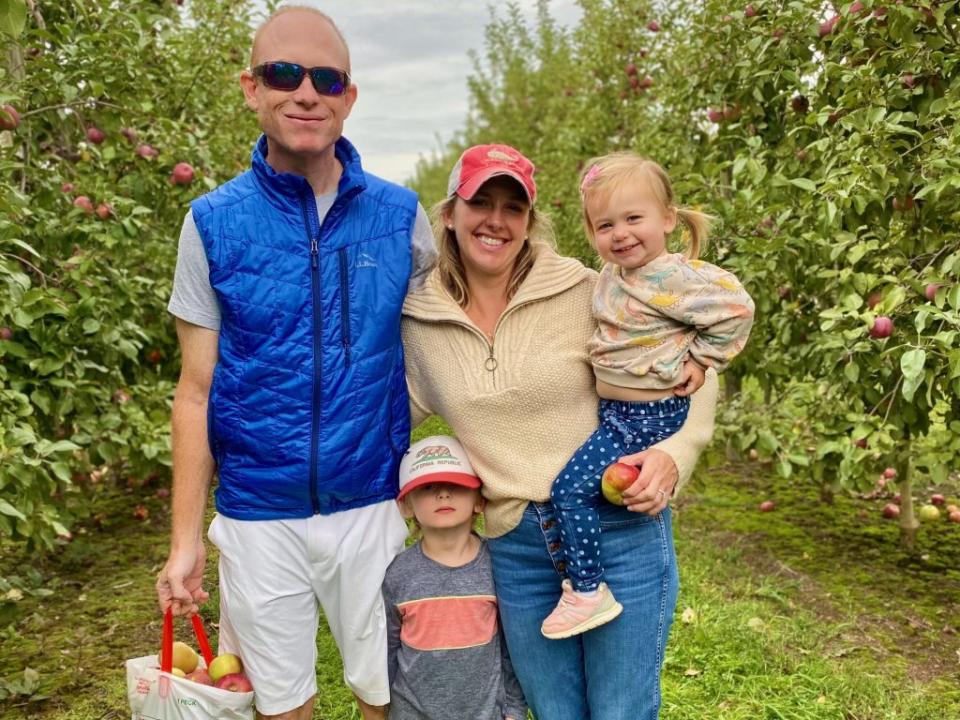 Jamie LaDuca and her family curing an apple picking excursion.