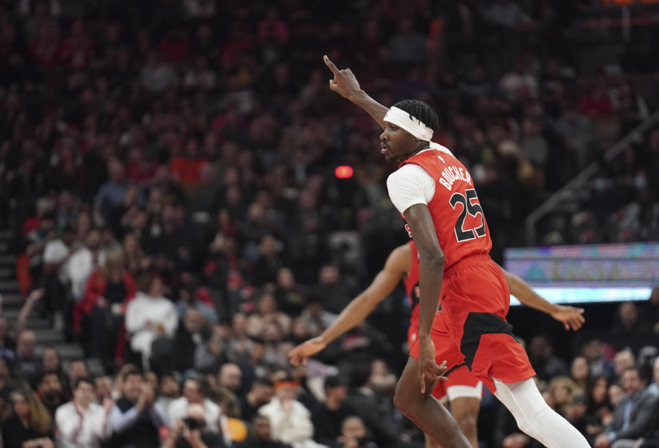 Toronto Raptors forward Chris Boucher (25) reacts after scoring against the San Antonio Spurs during the first half of an NBA basketball game Wednesday, Feb. 8, 2023, in Toronto. (Arlyn McAdorey/The Canadian Press via AP)