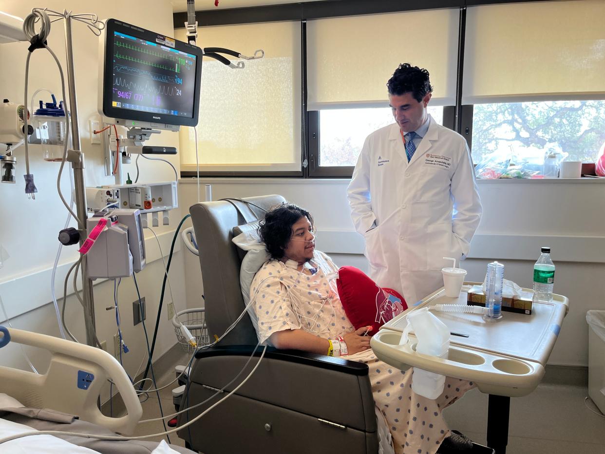 Dr. George Arnaoutakis checks in on Christian Duarte, who was recovering from heart surgery to repair an aneurysm in his aorta in November. Duarte's heart had been monitored since he was a child because he has Marfan syndrome. Arnaoutakis wanted to take care of the aneurysm proactively rather than wait for the aorta to tear.