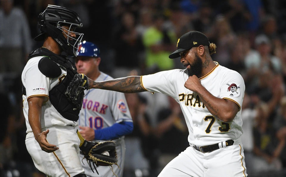 PITTSBURGH, PA - AUGUST 02: Felipe Vazquez #73 of the Pittsburgh Pirates celebrates with Elias Diaz #32 after the final out in an 8-4 win over the New York Mets at PNC Park on August 2, 2019 in Pittsburgh, Pennsylvania. (Photo by Justin Berl/Getty Images)