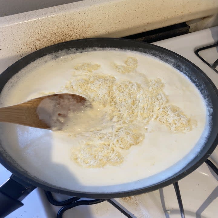 parmesan being added