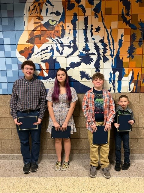 Honored for demonstrating the Portrait of a Tiger trait in December are, from left, Wyatt Estep, Rhiley Skaggs, Paul Price and Korbin Hurst.