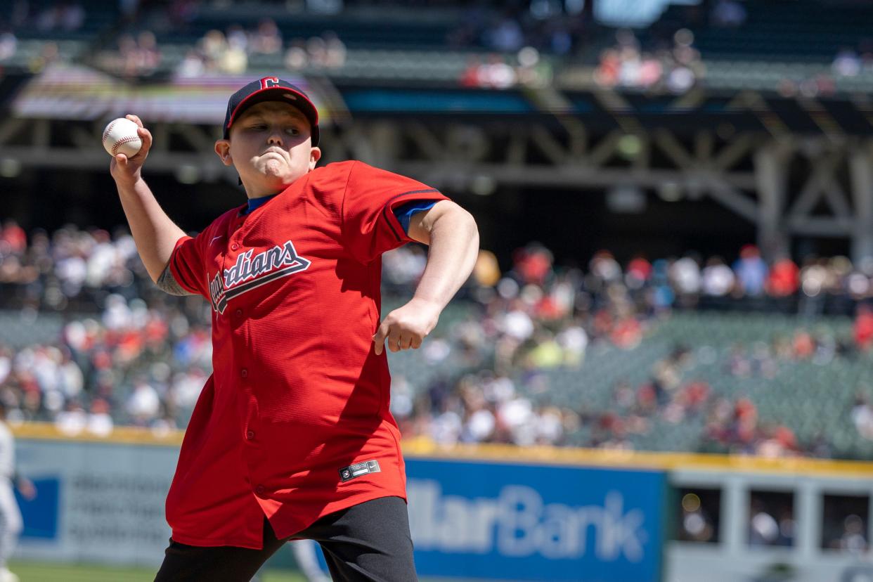 Micah Galuzny of Lexington throws out the first pitch during a Cleveland Guardians game on Wednesday, April 12, 2023. He is a pitcher for Ohio Prime, a travelling baseball team based out of Galion.