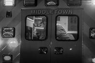 <p>The Middletown Fire Department responds to a call about a woman possibly overdosing on heroin. “You’re not going to get in trouble:” A fireman tries to convince her to go to the hospital. (Photograph by Mary F. Calvert for Yahoo News) </p>