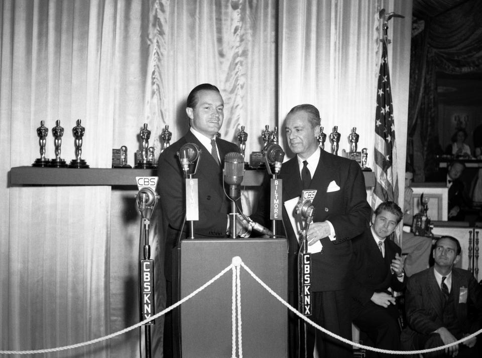 Bob Hope, left, hosts the Oscars at the Biltmore Hotel in Los Angeles, Feb. 26, 1942. / Credit: CBS via Getty Images