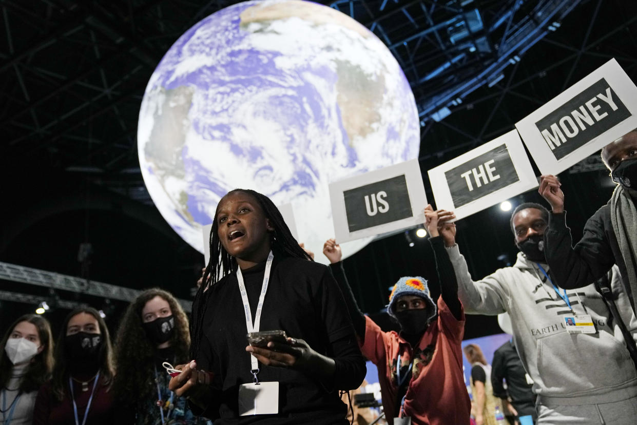 FILE - Climate activist Vanessa Nakate engages in a 'Show US The Money' protest at the COP26 U.N. Climate Summit in Glasgow, Scotland, Nov. 8, 2021. The climate change generation is saying officials are talking too much, listening too little and acting even less. And they are fed up. (AP Photo/Alastair Grant)