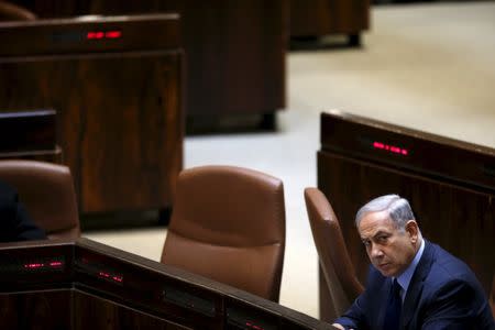 Israel's Prime Minister Benjamin Netanyahu attends a session for a no-confidence vote at the Israeli Parliament in Jerusalem February 8, 2016. REUTERS/Ronen Zvulun