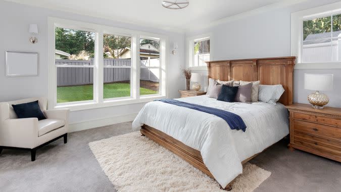 bedroom in newly constructed luxury home.