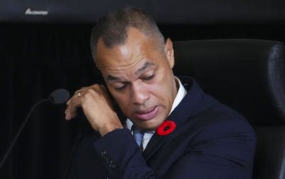 Former Ottawa police chief Peter Sloly wipes away tears as he gets emotional while appearing as a witness at the Public Order Emergency Commission in Ottawa on Oct. 28, 2022. THE CANADIAN PRESS/Sean Kilpatrick