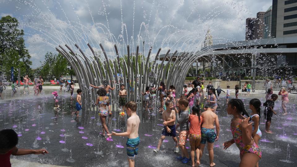 May 24, 2024; columbus, ohio, usa; The Scioto Mile Fountain in Bicentennial Park sprays as it reopened Friday to the delight of hundreds of children splashing in the water. Originally opening in 2011, the fountain was shut down in 2021 due to maintenance problems, then had to shut down again for a total rebuild beginning in May 2023. Enhancements in the $15 million rebuild include new lighting, water features and increased seating and shade areas.