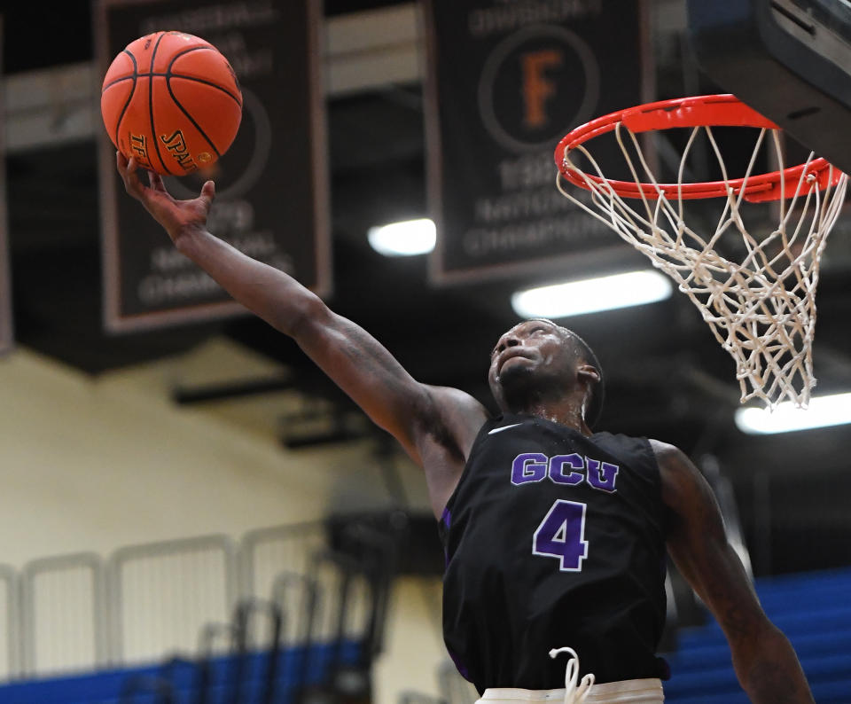 FULLERTON, CA - NOVEMBER 23: Oscar Frayer #4 of the Grand Canyon Lopes reaches for a rebound in the second half of the game against the Utah Utes during the Wooden Legacy Tournament at Titan Gym on November 23, 2018 in Fullerton, California. (Photo by Jayne Kamin-Oncea/Getty Images)