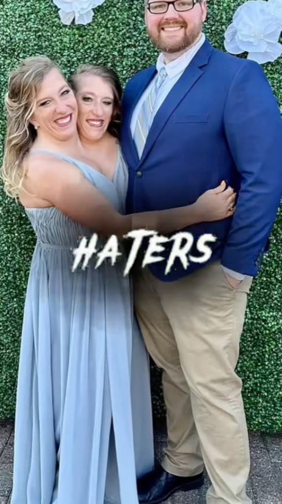 Conjoined twins Abby and Brittany Hensel posted this video on their TikTok — with Abby’s husband, Josh — with a message for online haters. abbyandbrittanyhensel/Tiktok