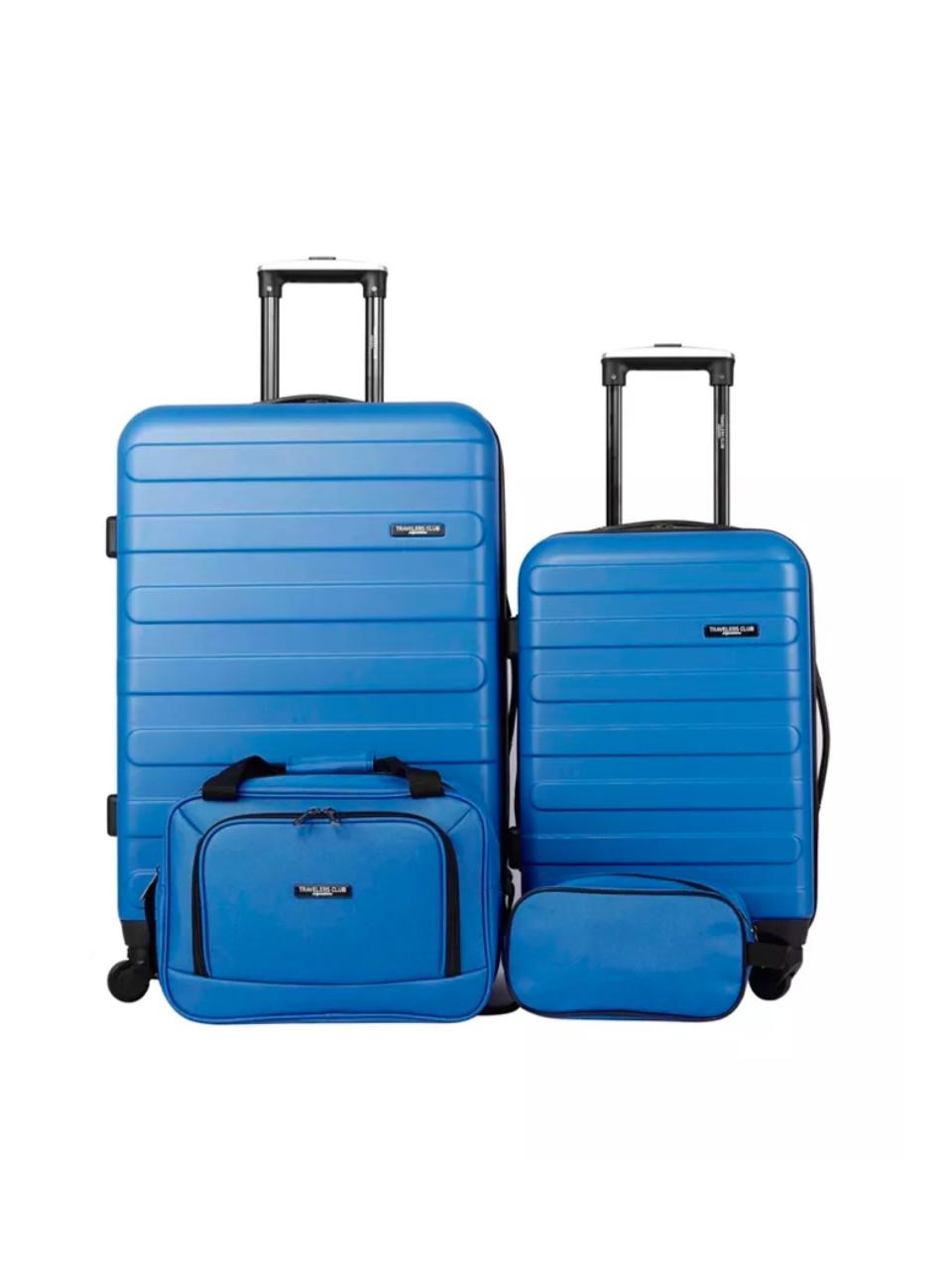 A four-piece baby blue luggage set with handles