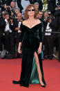 <p>Susan Sarandon got some major cool points with her Cannes Film Festival look by pairing her green velvet gown with square-frame shades. (Photo: Getty Images) </p>