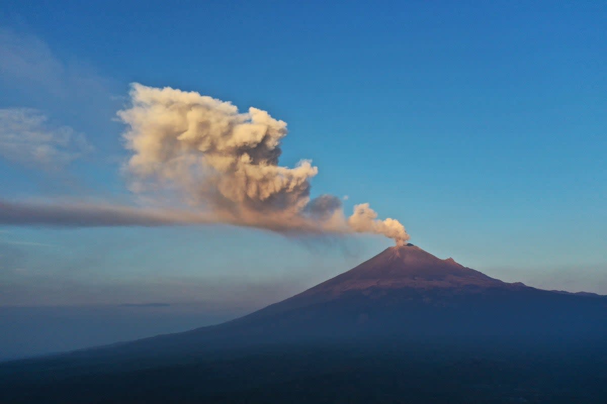 The Popocatepetl Volcano spews ash and smoke as seen from Puebal, state of Puebla, Mexico, on May 18, 2023 (AFP via Getty Images)